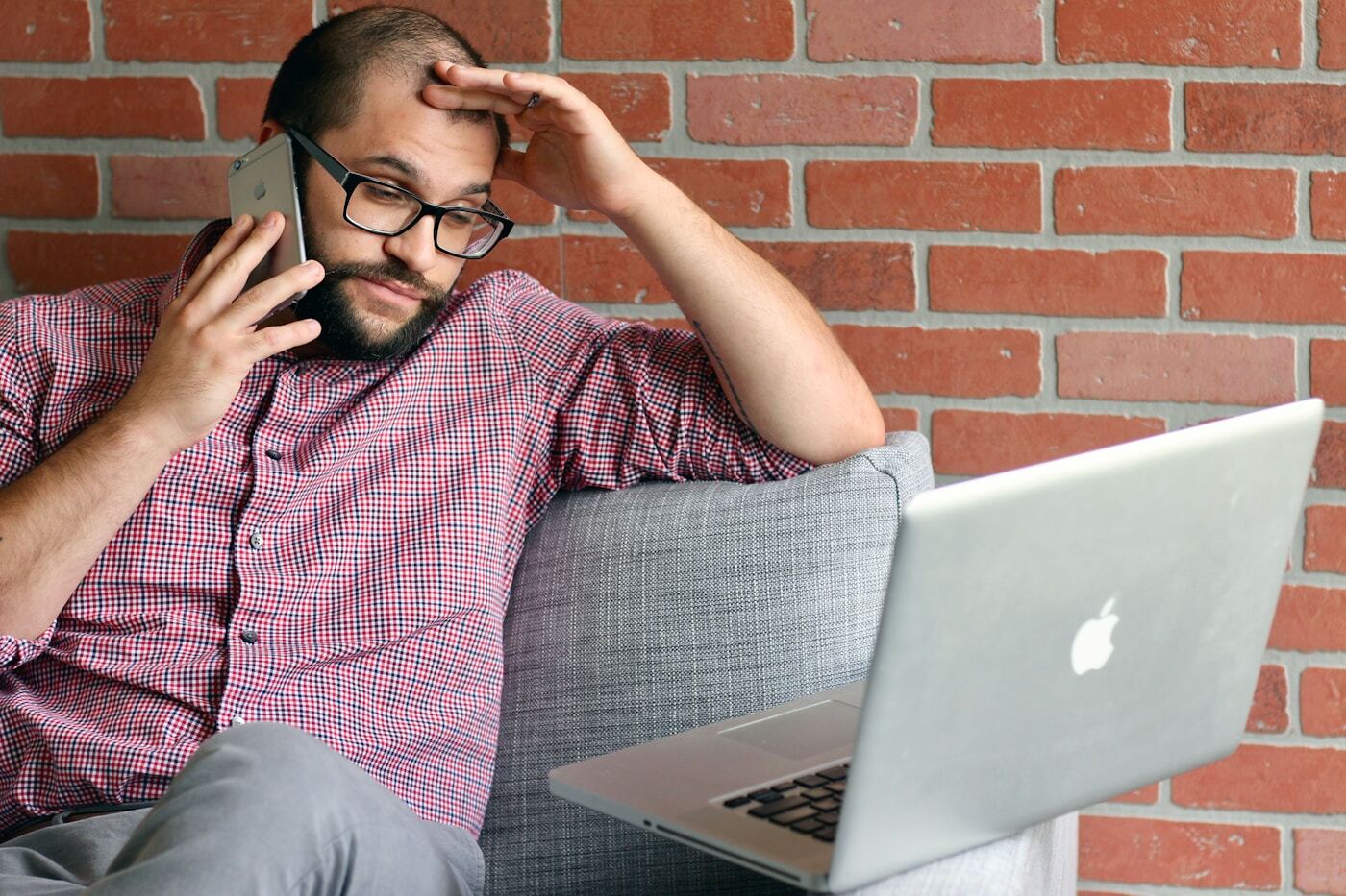 person frustrated at computer then discovering solution